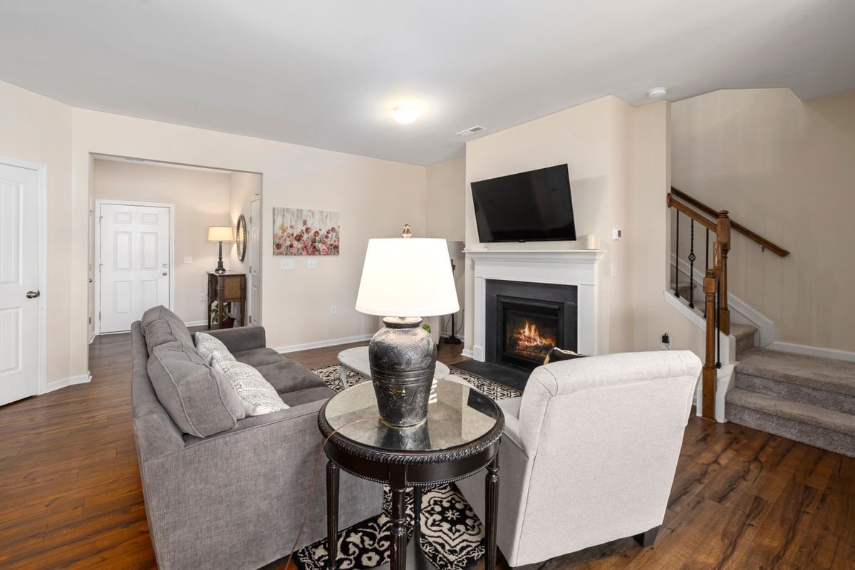 An elegant, welcoming living space with a fireplace